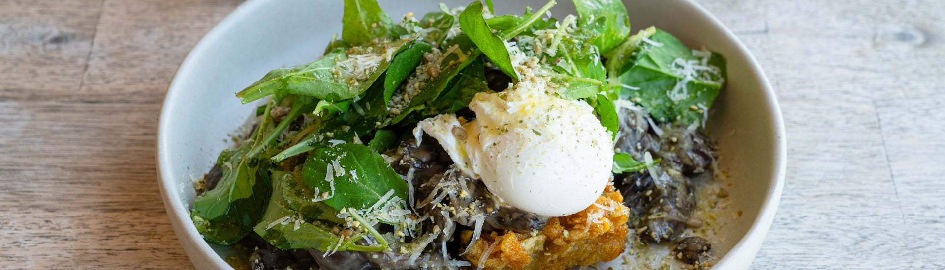 Stir fried sprouting broccoli with poached eggs recipe