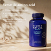 A cobalt blue bottle of Higher Nature Glutamine Powder Amino Acid stands on a beige surface with soft shadows. White text on the left lists product benefits, and the bottle label shows Higher Nature Body Health branding.
